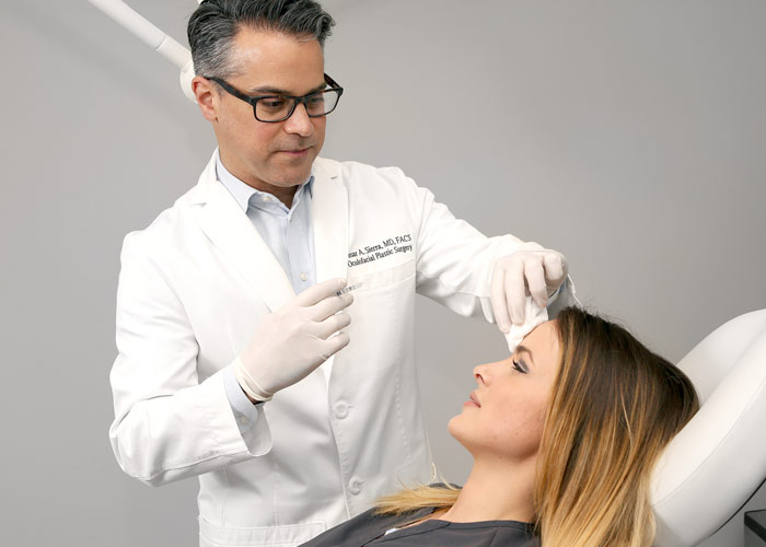 Dr. Sierra providing Botox injection for patient