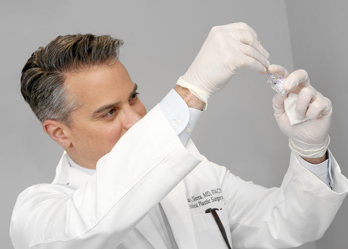 Dr. Sierra preparing Botox injection